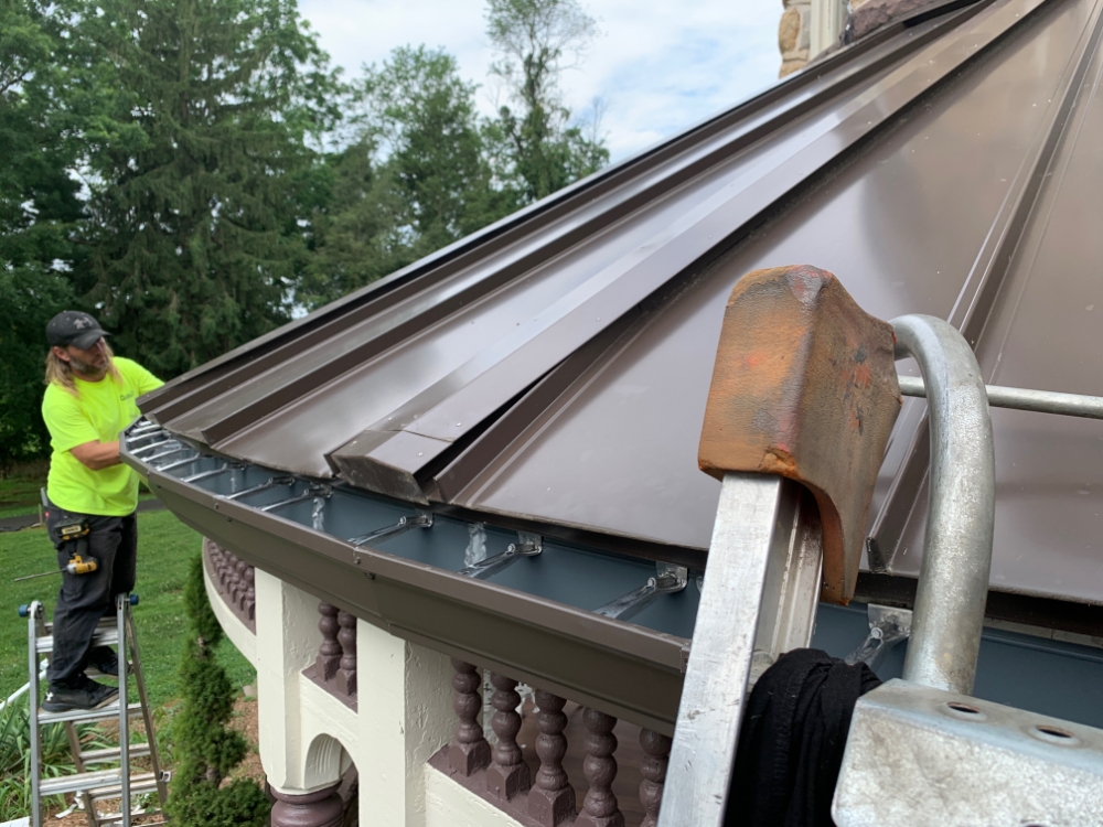 Gutters and Spouting custom curved installation