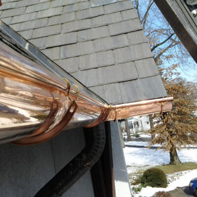 Half-round copper gutters installation detail