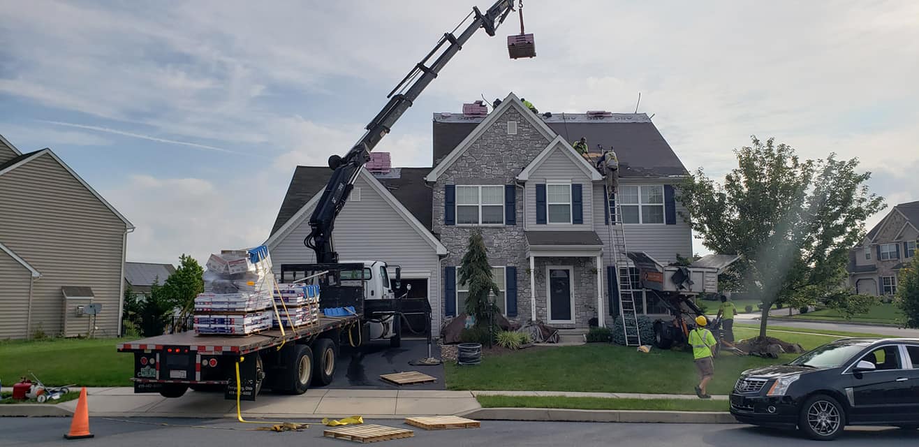 Roof Replacement material drop-off.